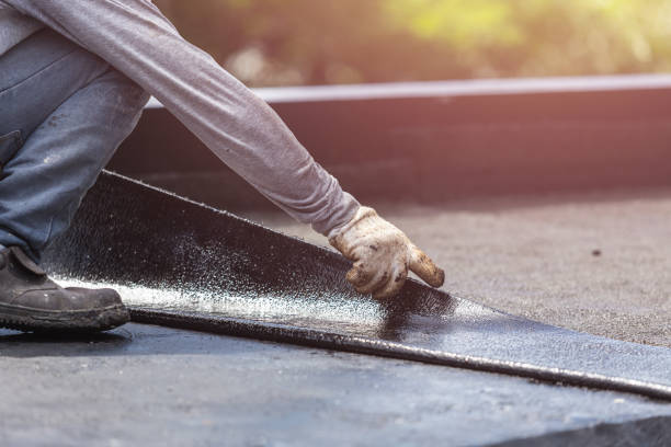 Professional Basement Waterproofing technician working in Harpster, OH